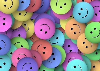 gratidão ilustração bolas coloridas com carinha de sorriso